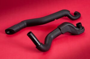 Custom molded polyurethane foam for pipe covers.